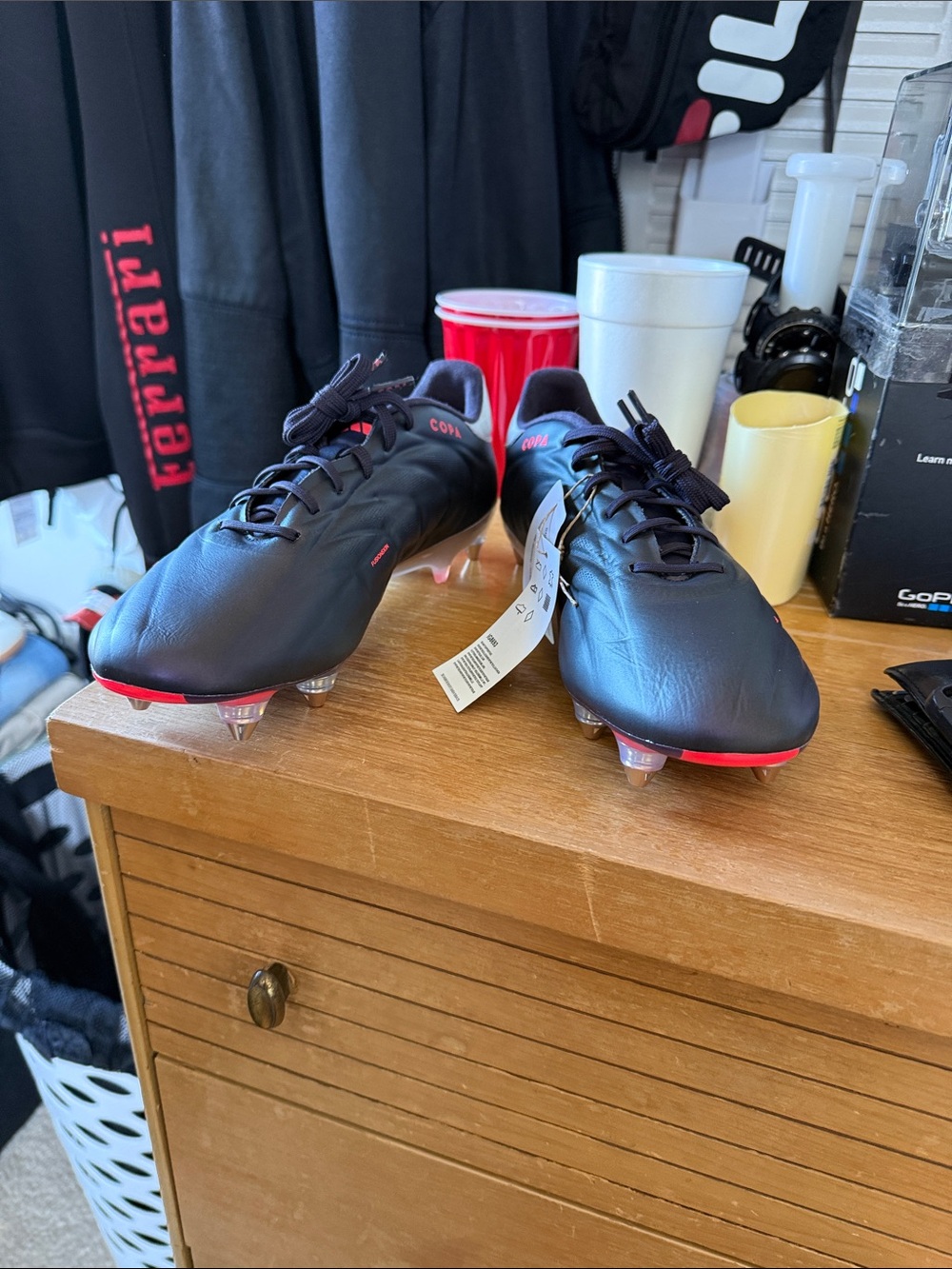 adidas Black Soccer Cleats with Red Detailing